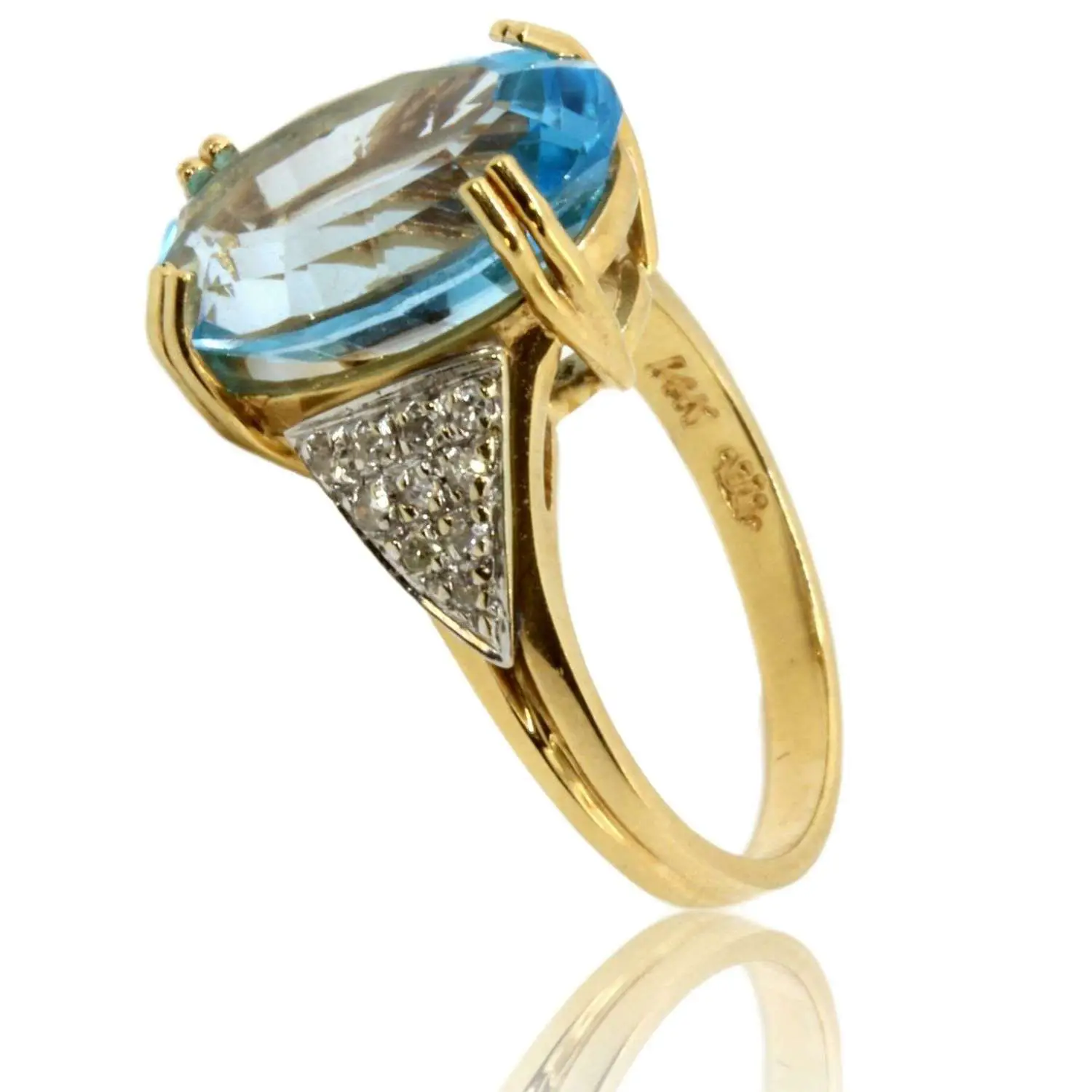 14K Gold Blue Topaz &  .13ctw Diamond Ring