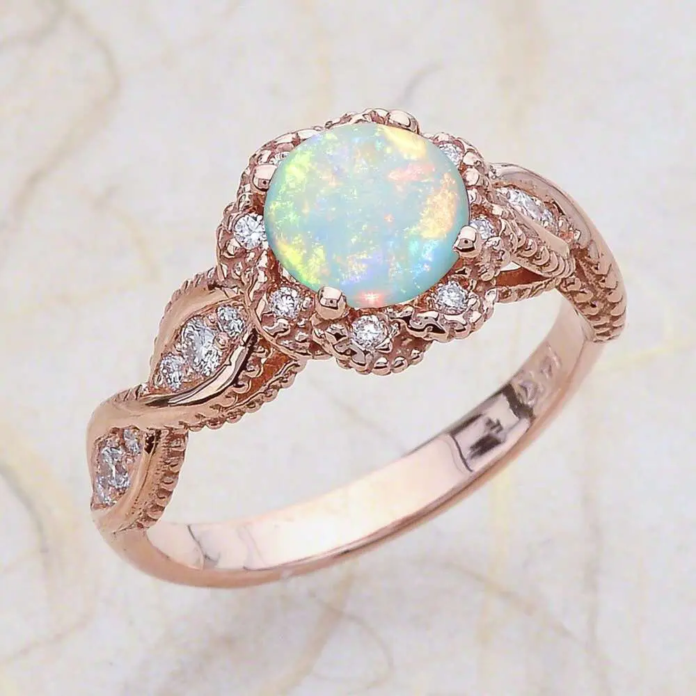 14K Vintage Rose Gold Engagement Ring Center Is A Round Opal
