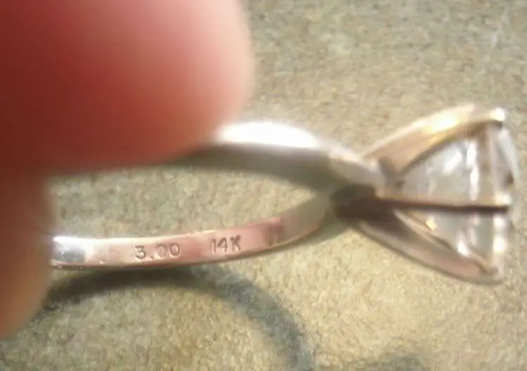 What does 3.00 14K and ULTRAGEM (SD) mean stamped in ring?