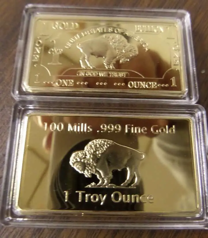 What is one troy ounce of gold clad worth ...