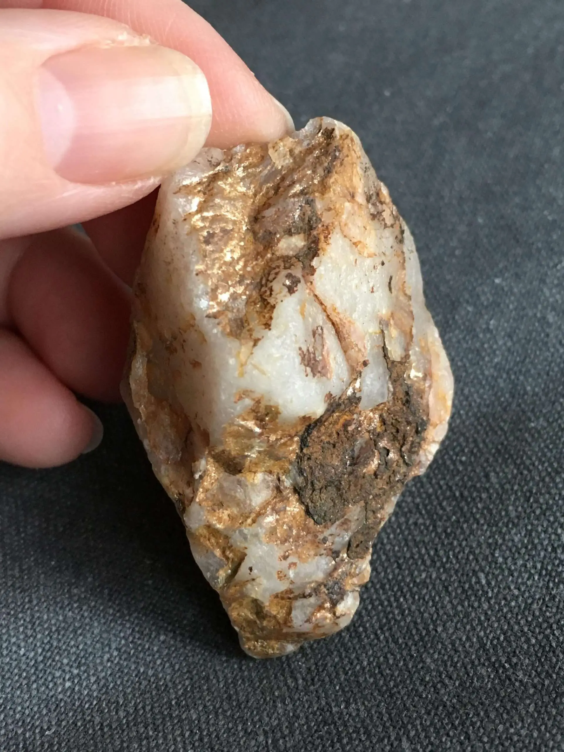 What is the metallic gold on this rock??? Found this in a ...