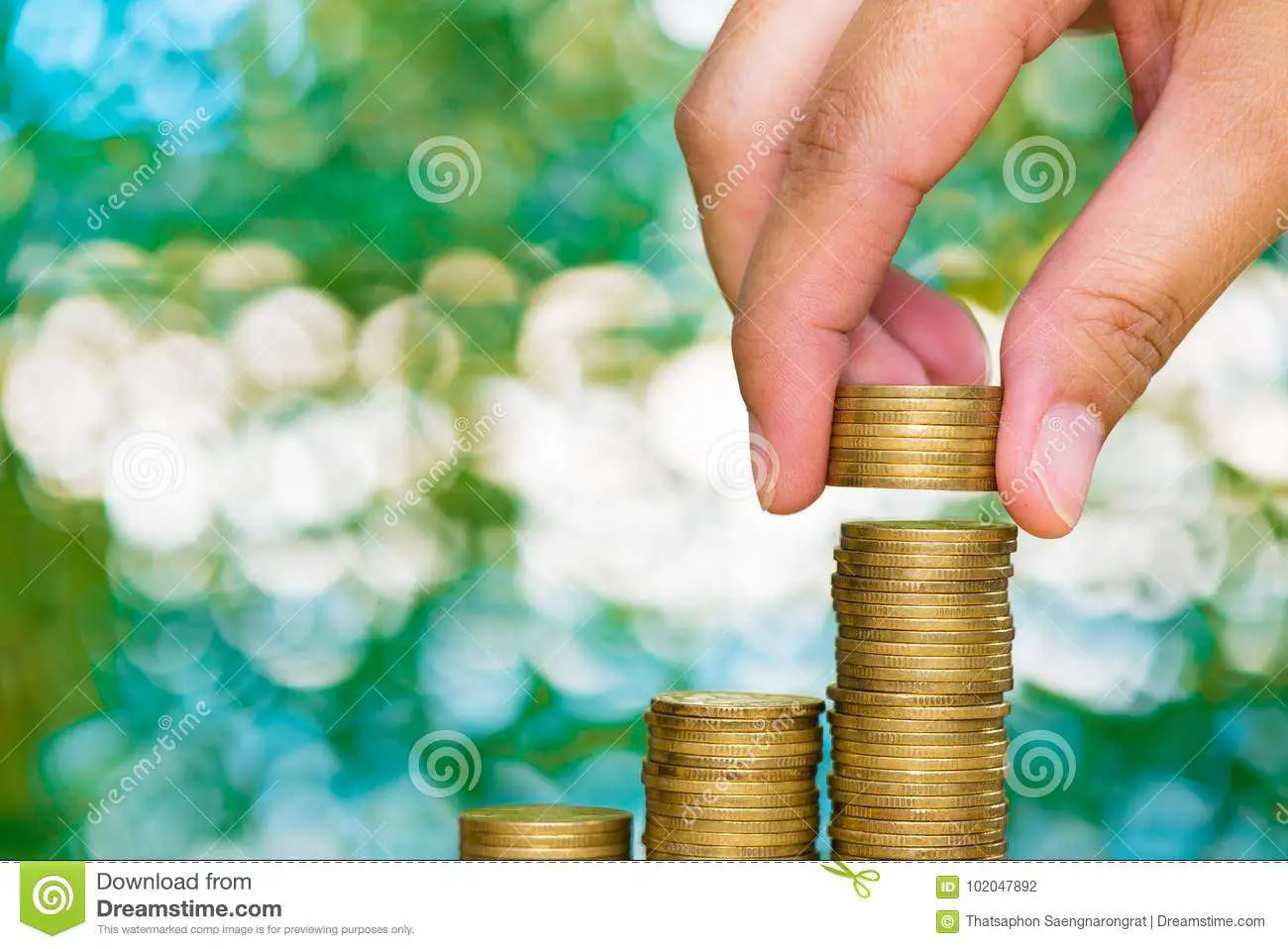 Woman Hand Put Coin On Step Of Coins Stacks And Gold Coin ...